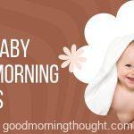 cute baby with white towel on head and laughing