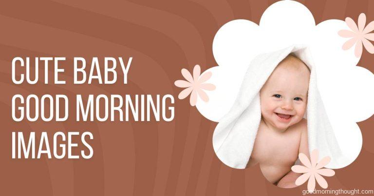 cute baby with white towel on head and laughing