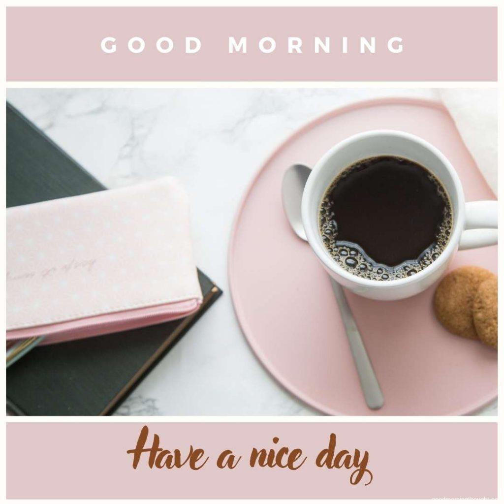 Coffee on the office table in tray with good morning message