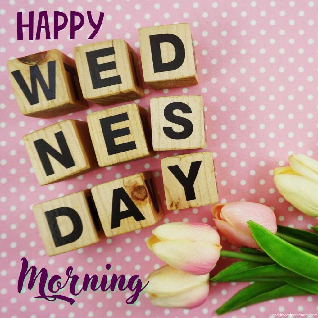 Wednesday word made from wooden cubes with letter alphabet. Wednesday image