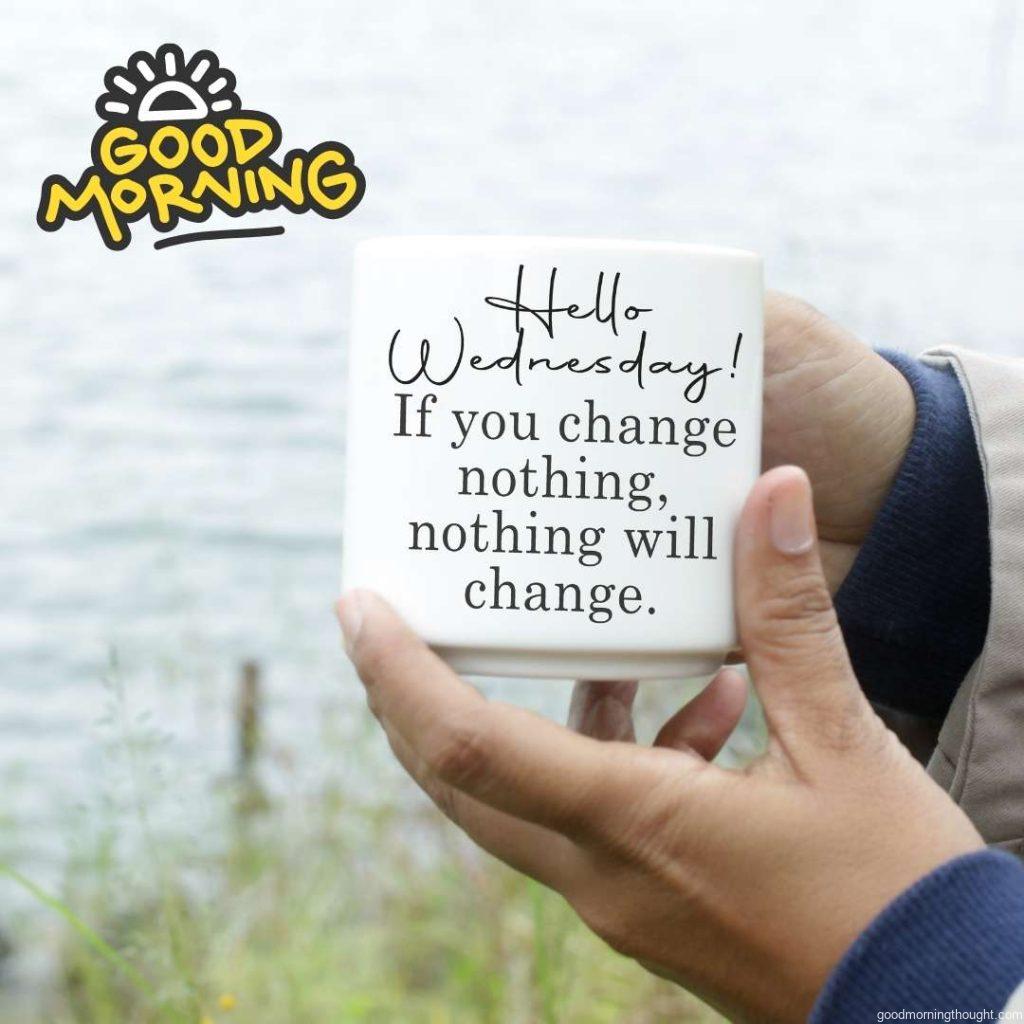 White coffee cup in young women's hand with Wednesday motivational and inspirational quote. Good Morning Wednesday Image