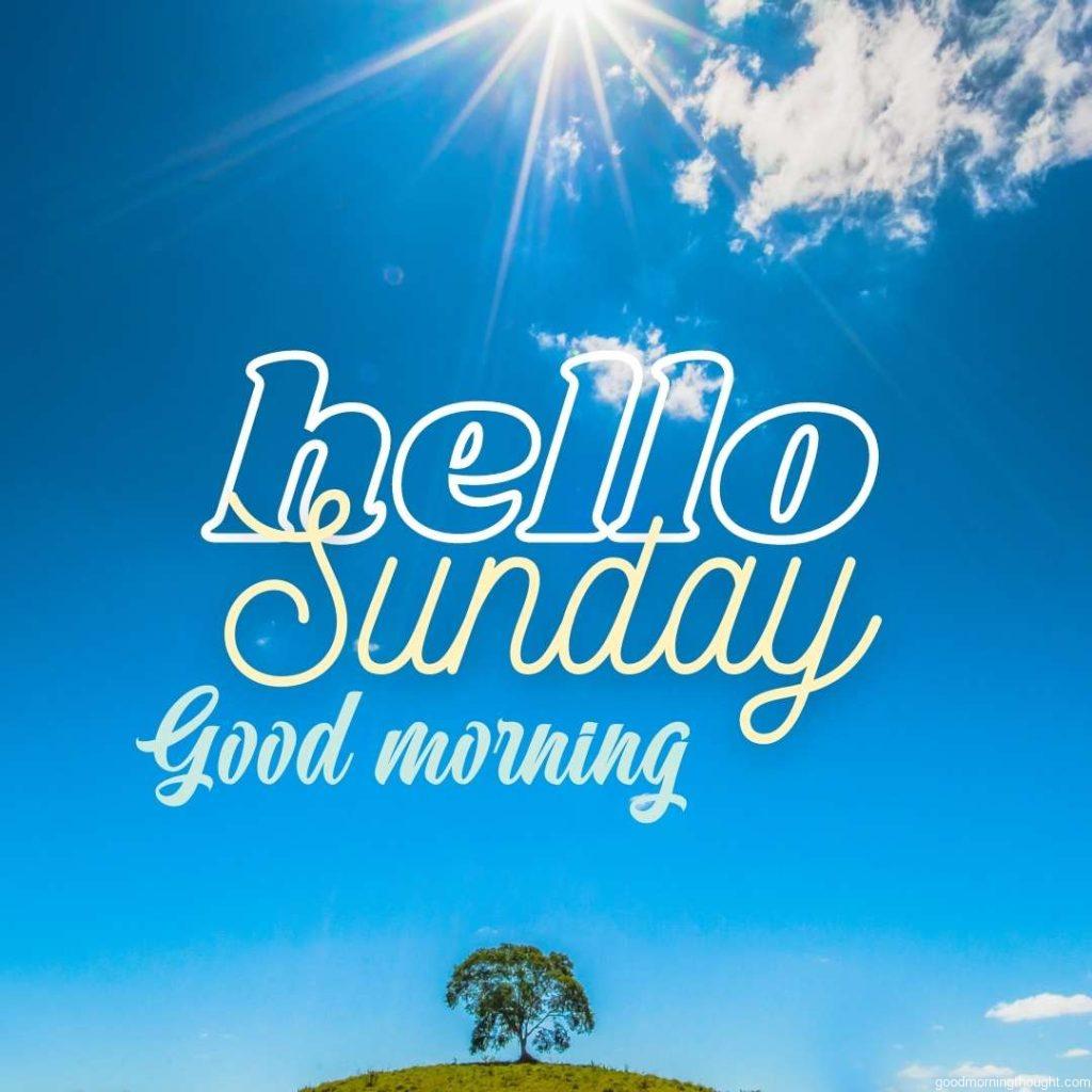 beautiful blue sky with white clouds and written hello Sunday