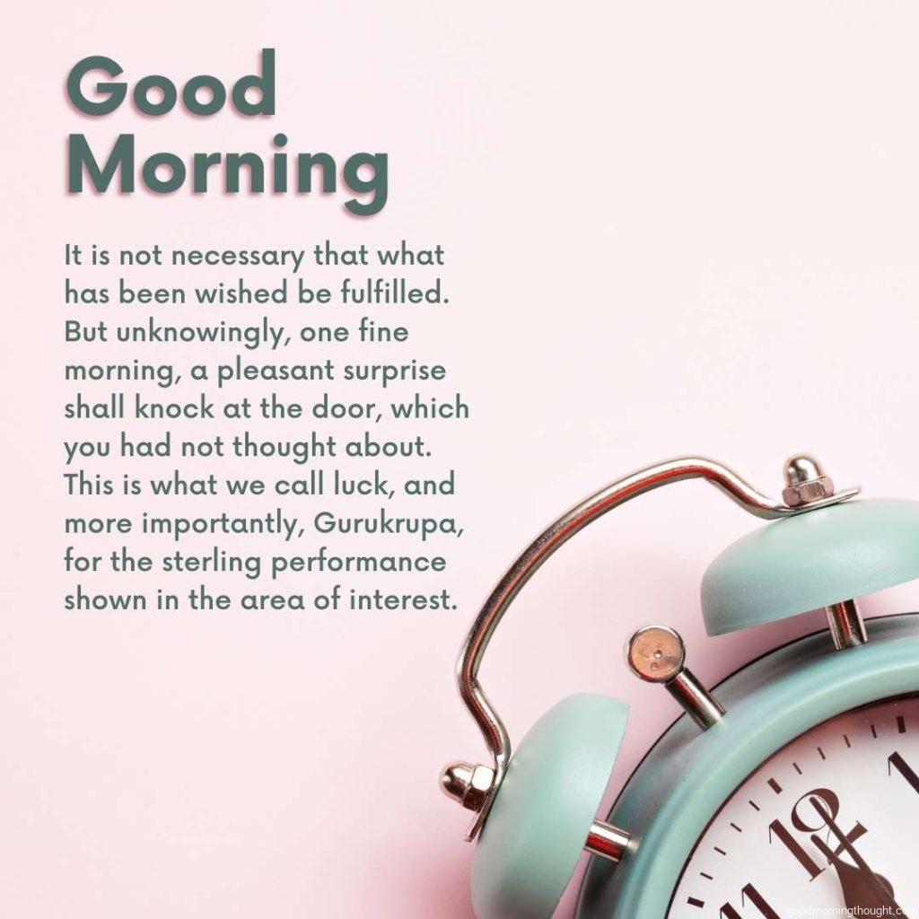 good morning quote and clock on pastel pink background