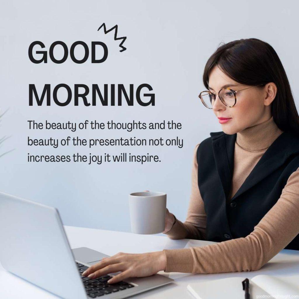 young business women sitting on laptop with coffee mug