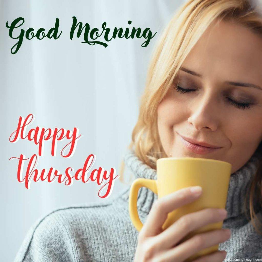 A beautiful young woman is enjoying a cup of coffee in the background, accompanied by a _Good Morning, Happy Thursday_ text