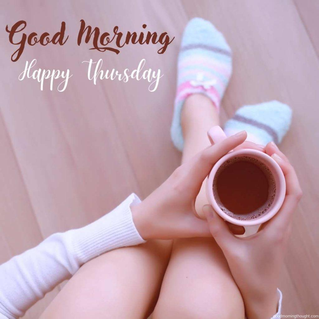 A girl drinking coffee in a cosy morning is in the background with a _Good Morning, Happy Thursday_ text