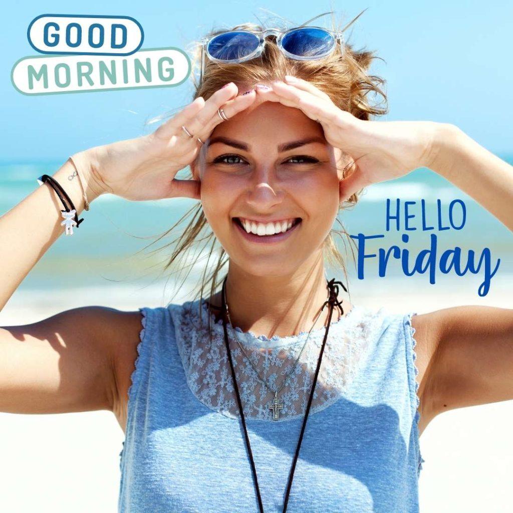 A young woman at the beach enjoys Friday in the morning