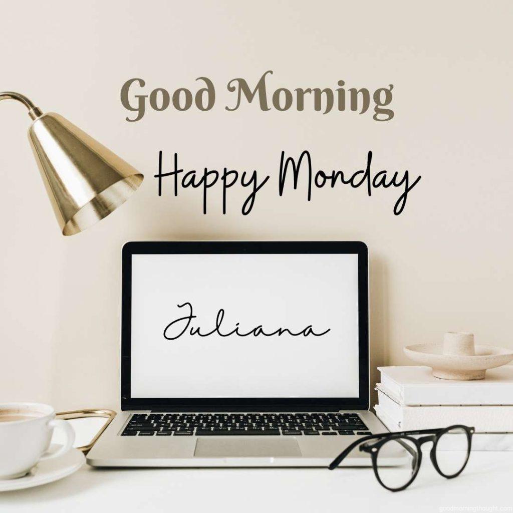 Blank screen laptop. Home office desk table workspace Copy the space mockup template in the background, on which _Good morning, happy Monday_ text is written