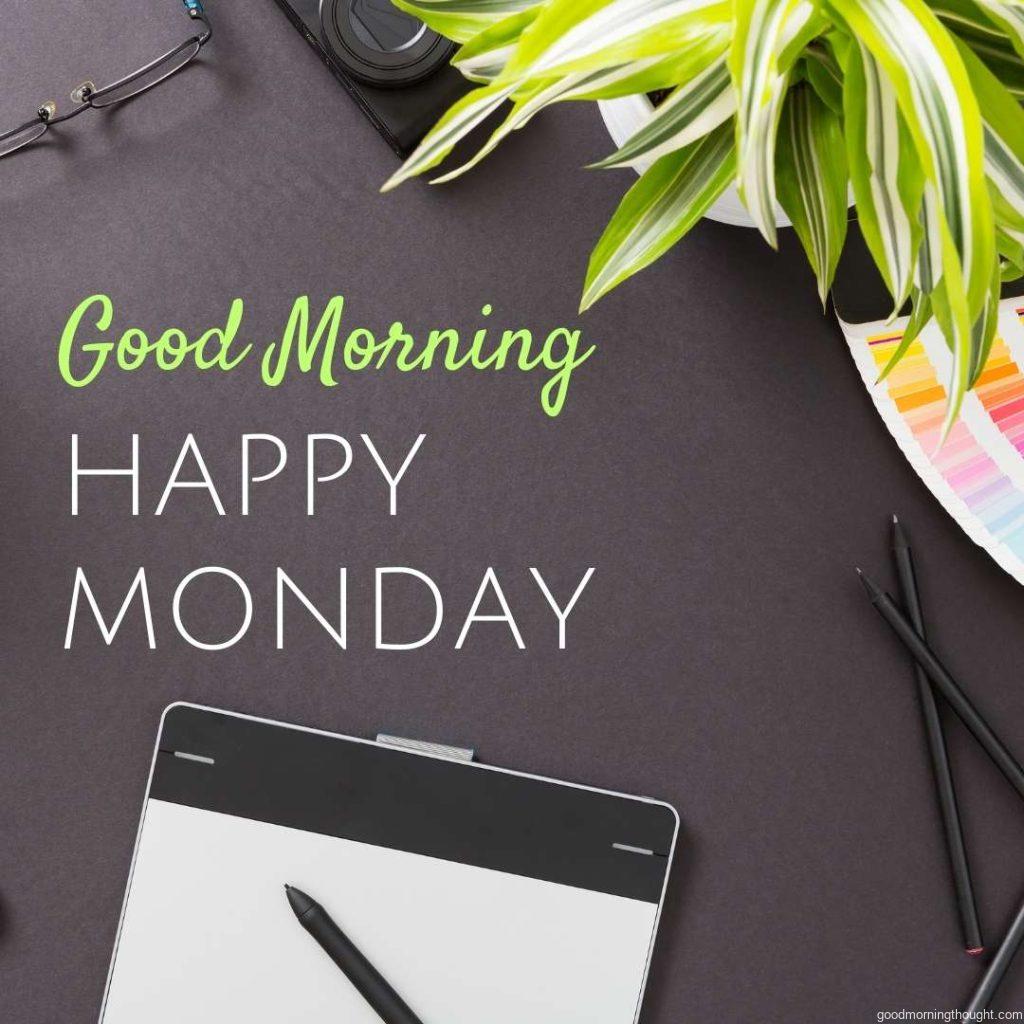 Design Designer Creative Graphic Desk Table and Good morning, happy Monday_ text are written on it