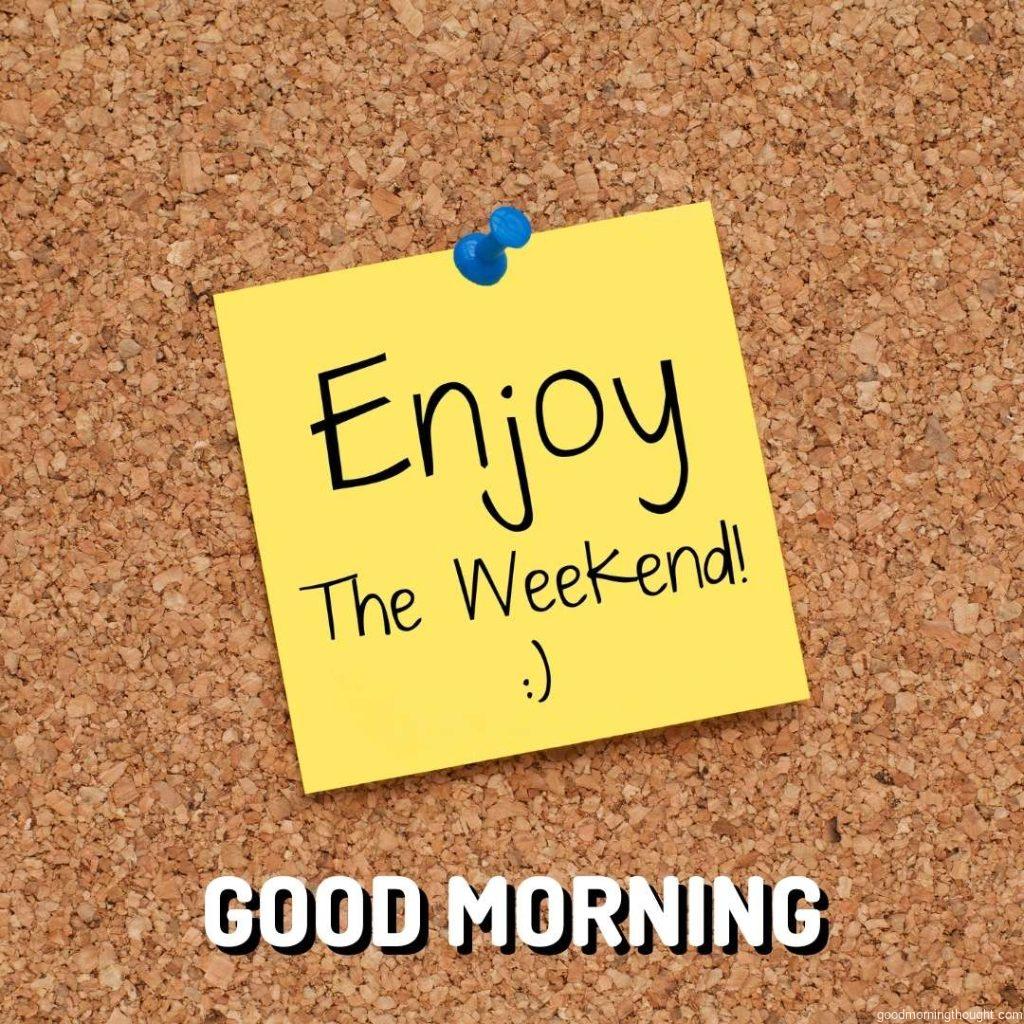 Enjoy the weekend note on the corkboard with a good morning text