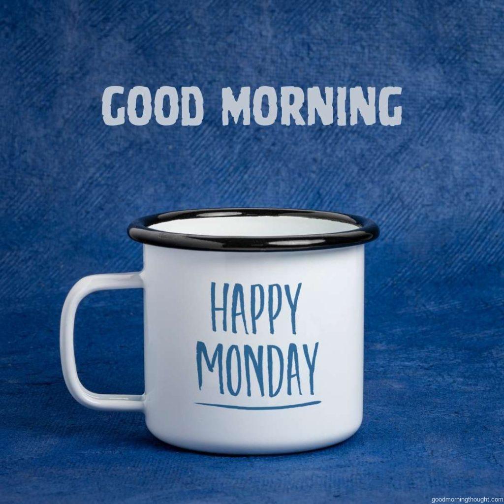 Happy Monday_ a white metal enamel cup of tea on a blue textured paper background with Good Morning text with a copy space, a cheerful and positive office concept