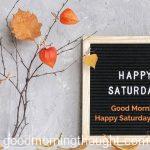 Happy Saturday text on a black letter board and a bouquet of branches with yellow leaves on clothespins in a vase on the table Good Morning, Happy Saturday Images