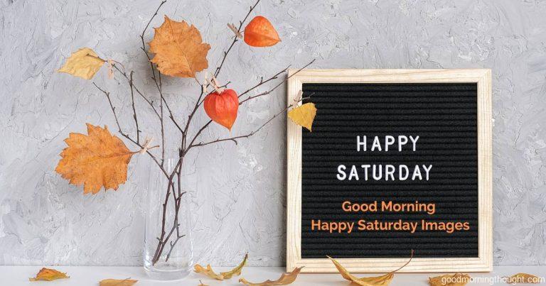 Happy Saturday text on a black letter board and a bouquet of branches with yellow leaves on clothespins in a vase on the table Good Morning, Happy Saturday Images