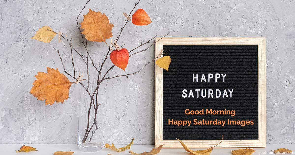 Happy Saturday text on a black letter board and a bouquet of branches with yellow leaves on clothespins in a vase on the table Good Morning, Happy Saturday Images