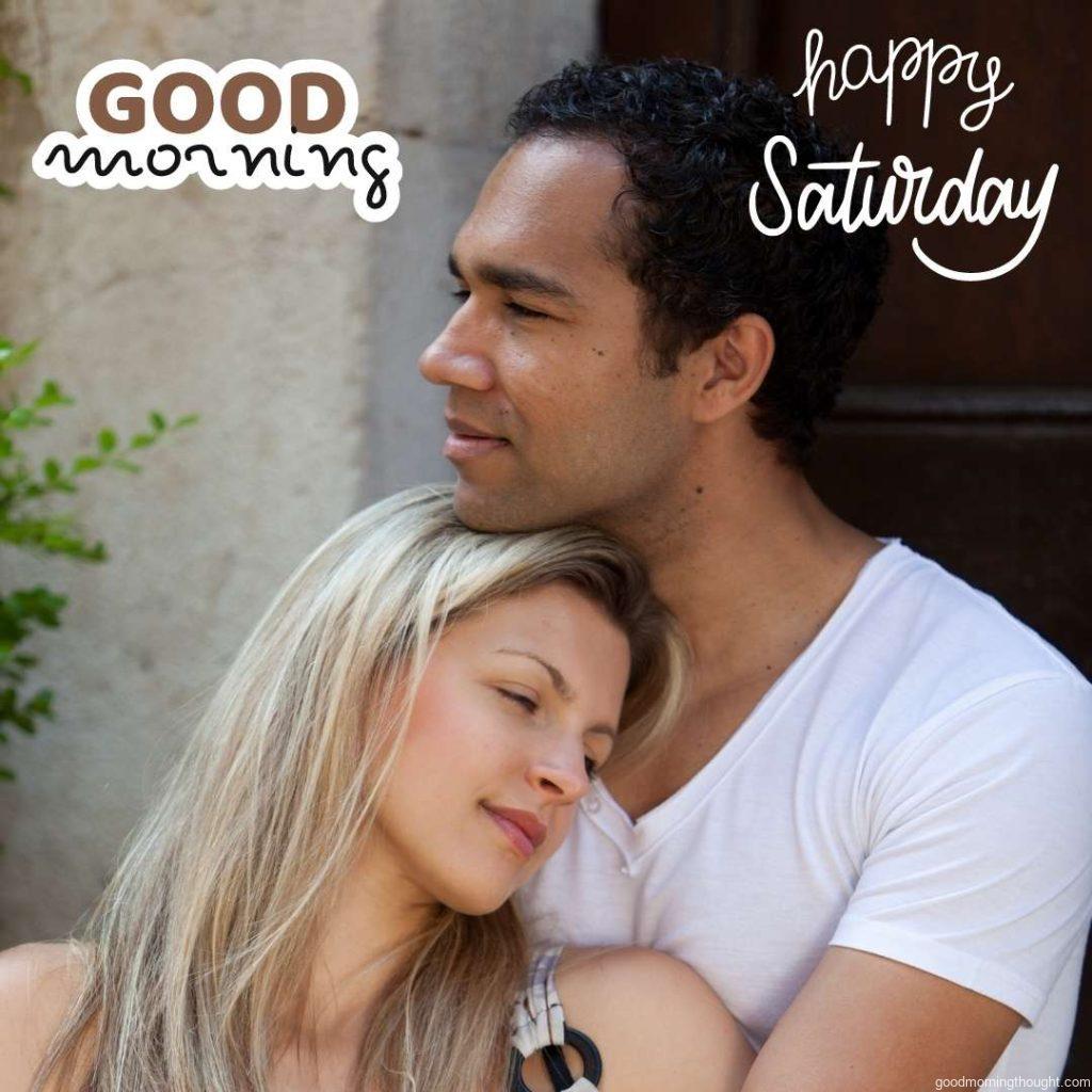 Happy mixed couple with the _Good Morning, Happy Saturday_ text