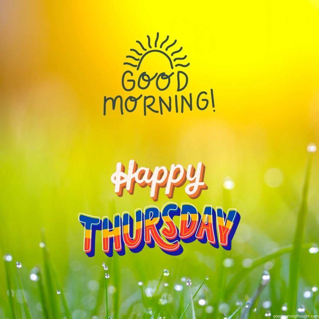 In the background Morning dew on blades of grass early in the morning; _Good Morning, Happy Thursday_ text appears on it