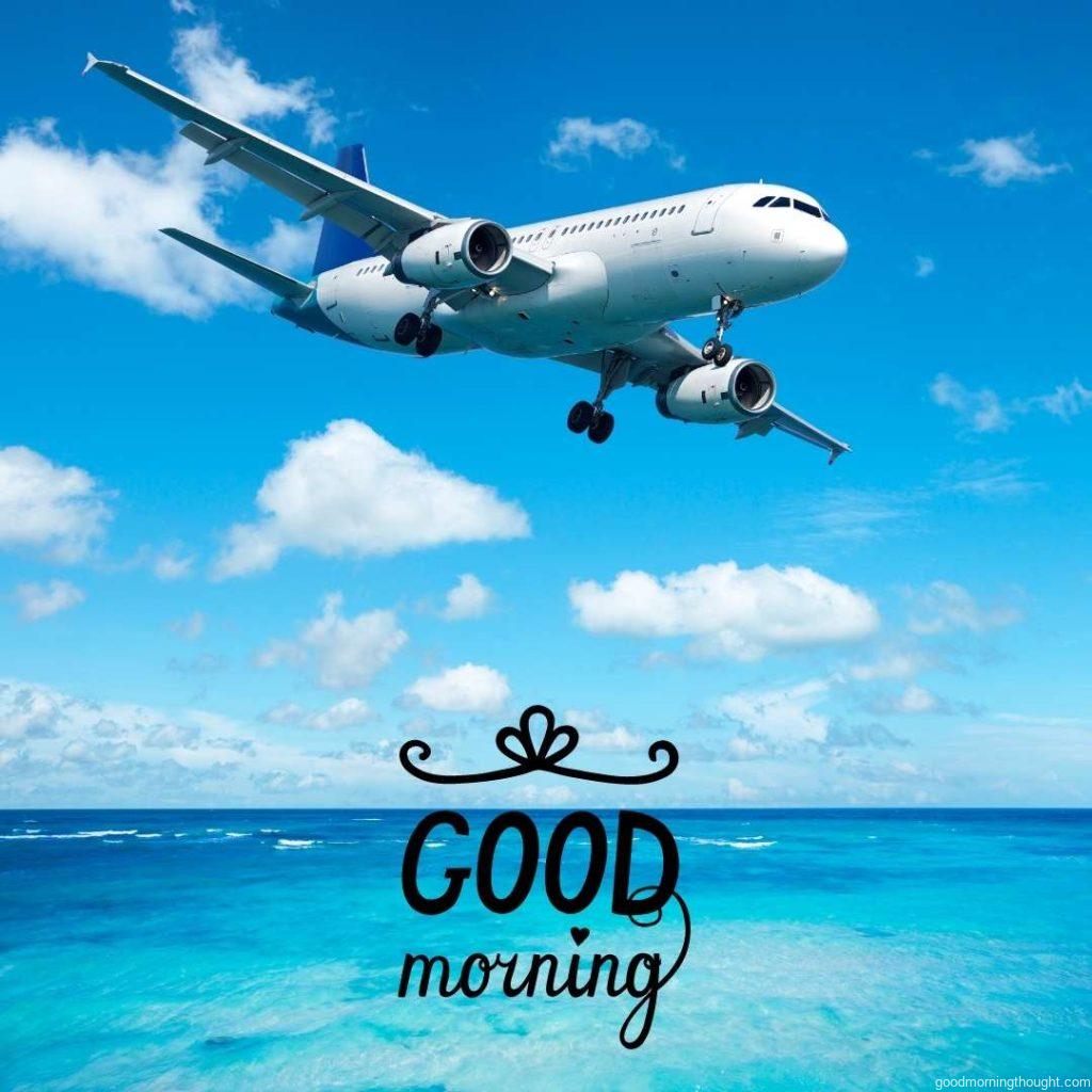 Jet plane is flying over a clear blue sea. Good morning, beach images