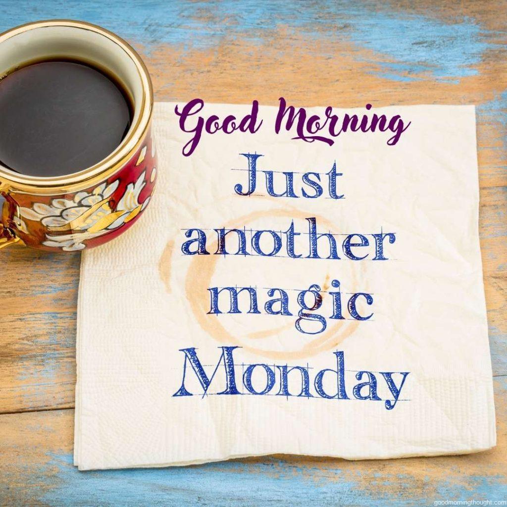 Just another magic Monday, Good Morning_ handwriting on a napkin with a cup of coffee