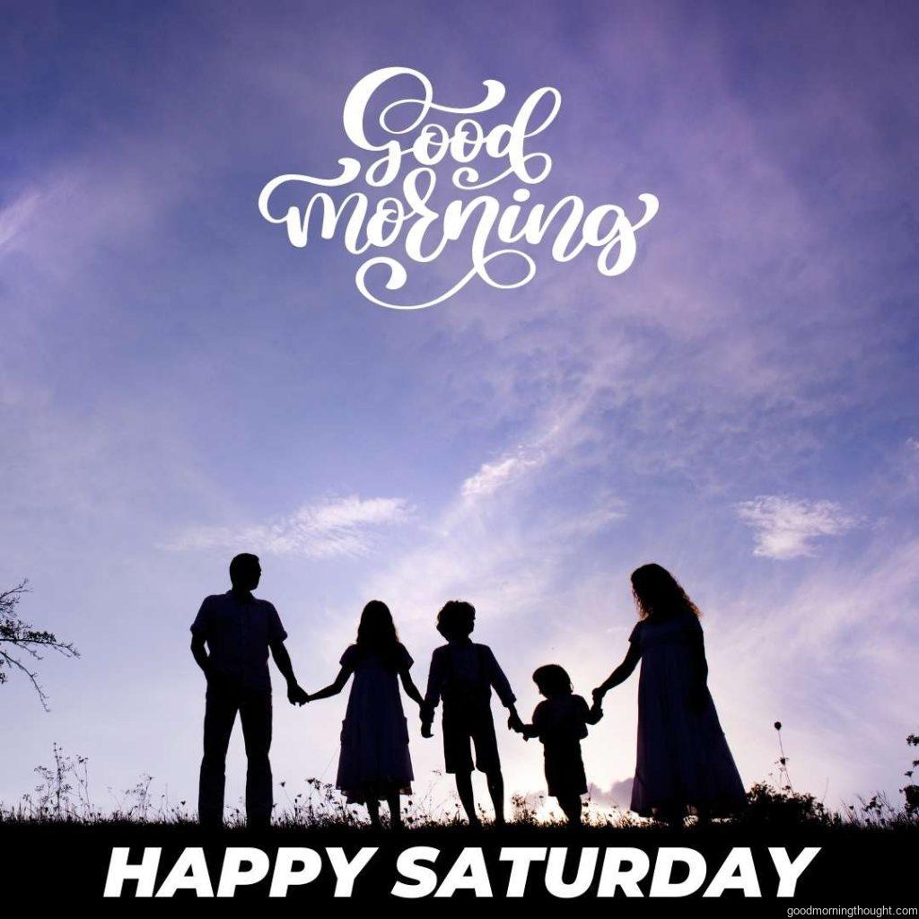 Silhouettes of happy parents having fun with their children with the _Good Morning, Happy Saturday_ text