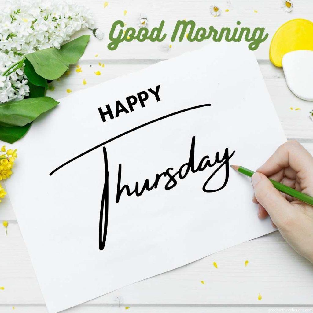 Woman Writing on a Blank Sheet of Paper_ _Good Morning, Happy Thursday_ Text