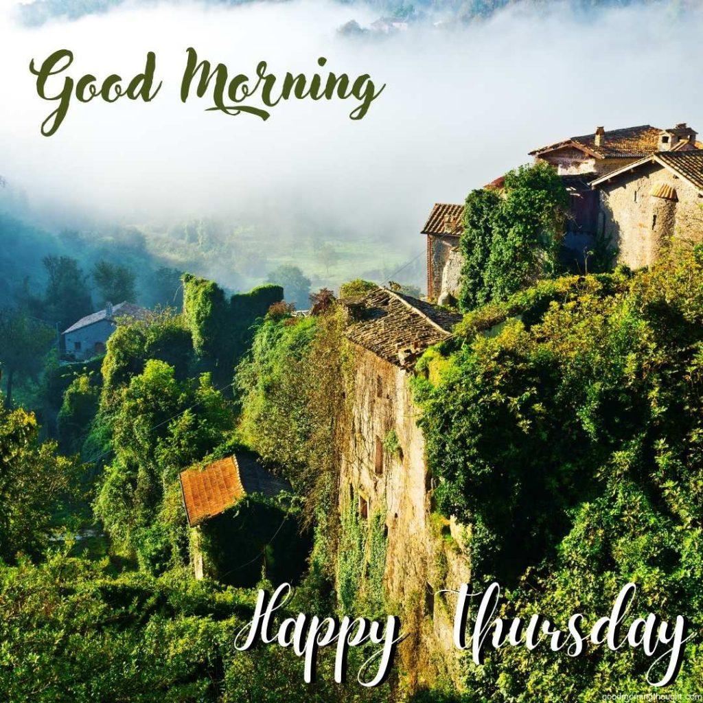 in the background, Morning Mist over Italian Mediaeval Town with a _Good Morning, Happy Thursday_ text