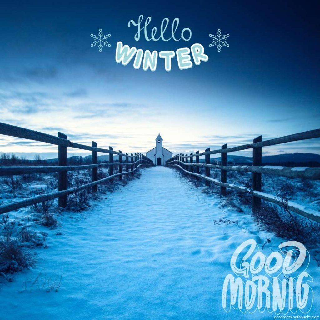 A fenced pathway covered in snow leading towards a small historic church. Good Morning, Winter Images