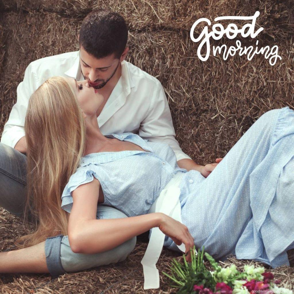 A loving couple kissing in the hay in the village, Love Romantic Kiss Good Morning Image