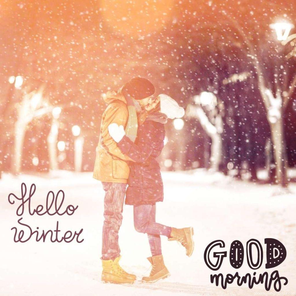 A loving couple kissing on a snowy winter night Good Morning, Winter Images