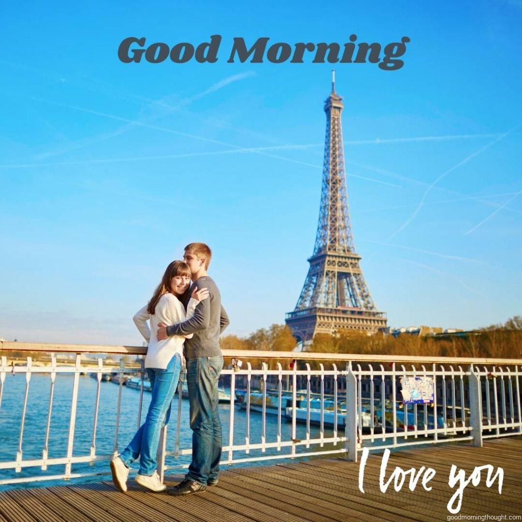 A romantic, loving couple in Paris hugging on a bridge near the Eiffel Tower on a nice spring day, Love Romantic Kiss Good Morning Images