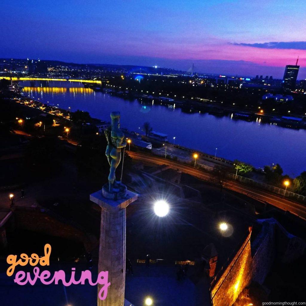 An evening glimpse of the most iconic lower back of Serbia's capital, the river Sava and Branko bridge, with _good evening_ text