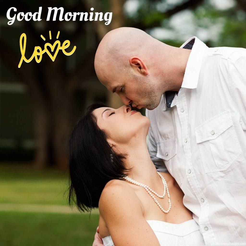 Beautiful young couple kissing, Good morning text