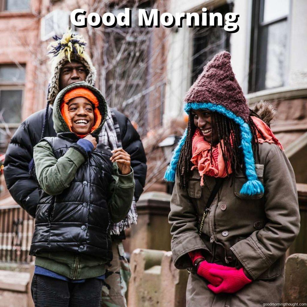 Family Wearing Winter Clothing, _Good morning_ text