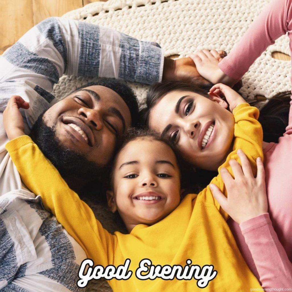 Family evening at home with a multiracial family Daughter hugging her parents. Good evening images