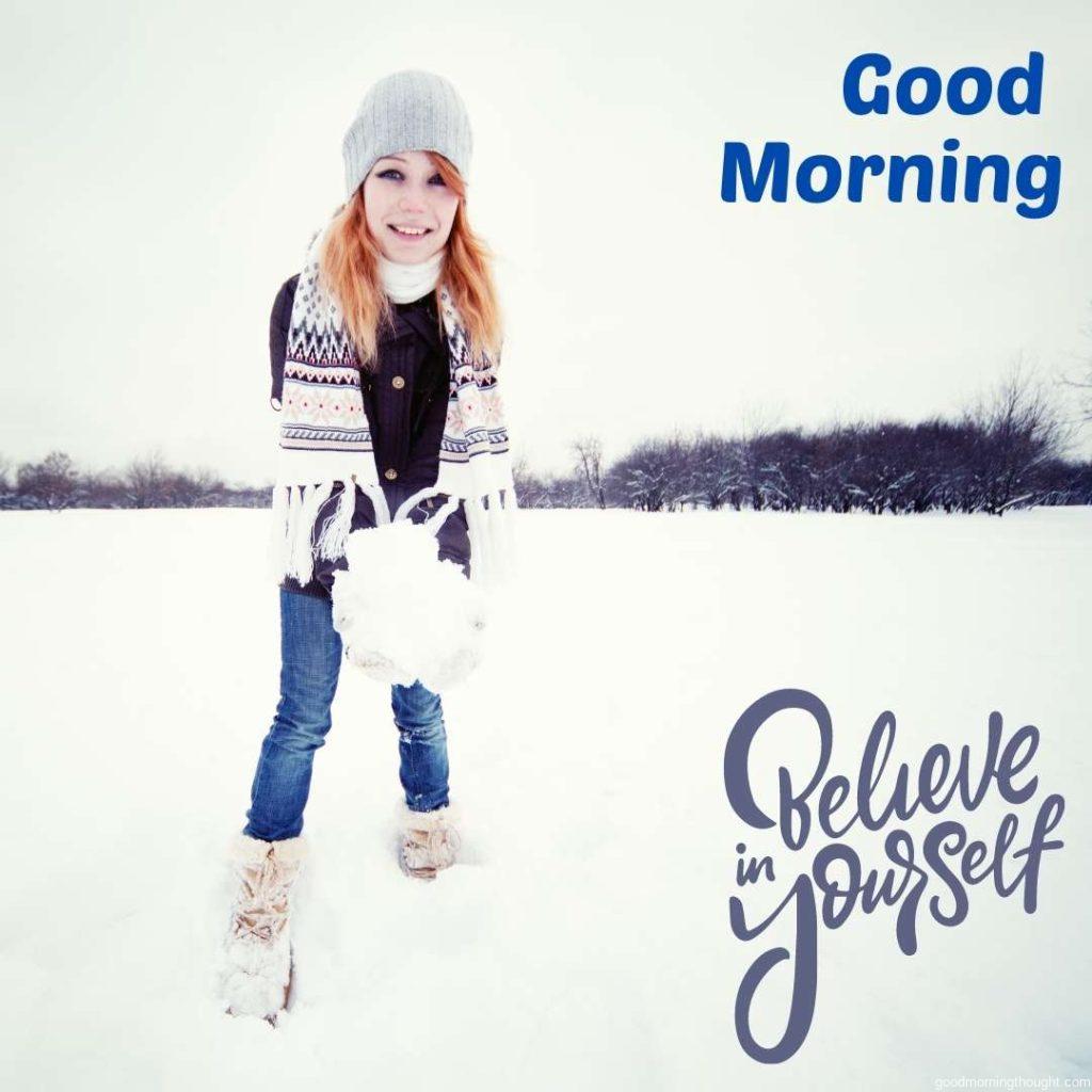 Happy young woman in the winter park, _Good morning_ text