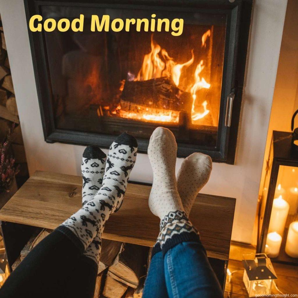 Lazy winter day in front of the fire in the fireplace, _Good morning_ text