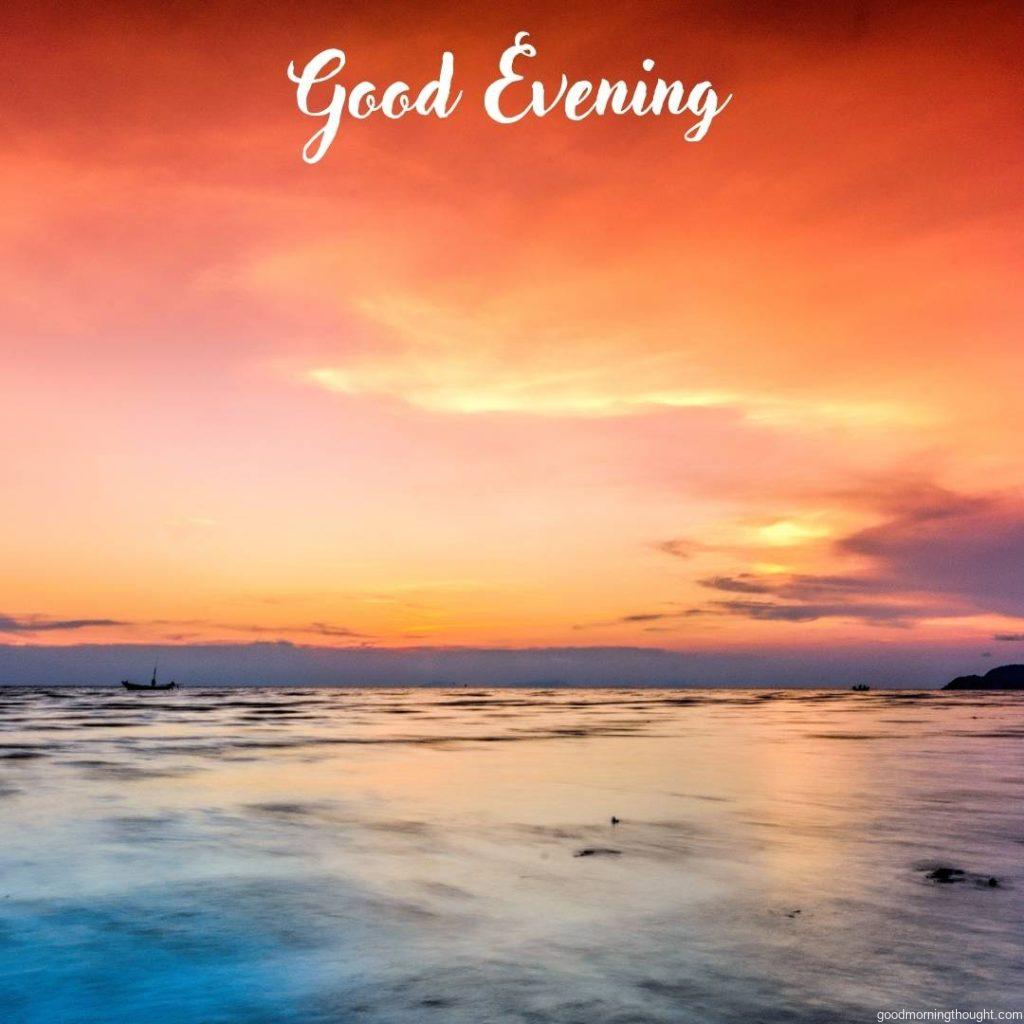 Lovely evening view with lake and yellowish sky with _Good Evening_ text