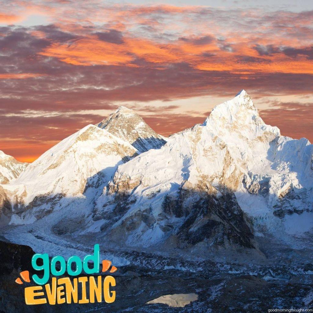 Mount Everest, evening panoramic view with beautiful sunset clouds from Kala Patthar, Sagarmatha National Park, Khumbu Valley, Solukhumbu, Nepal Himalayas, with the _good evening_ text