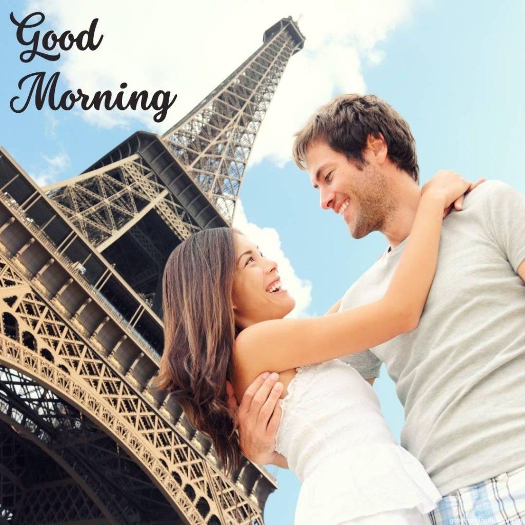 Paris Eiffel Tower_ a romantic couple embracing and kissing in front of the Eiffel Tower, Happy young interracial couple, Asian woman, Caucasian man, romantic kiss Good morning images