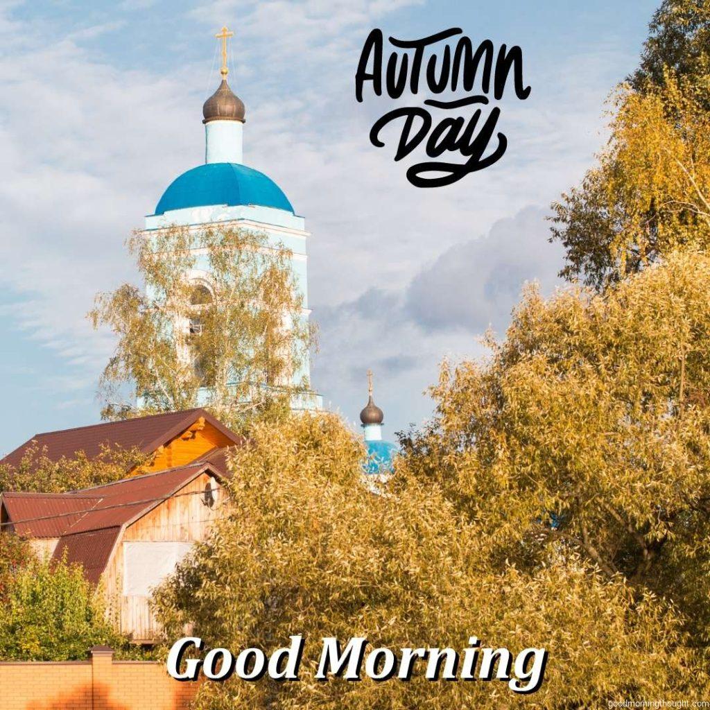 Pictured_ the autumn landscape, church, and Good morning text