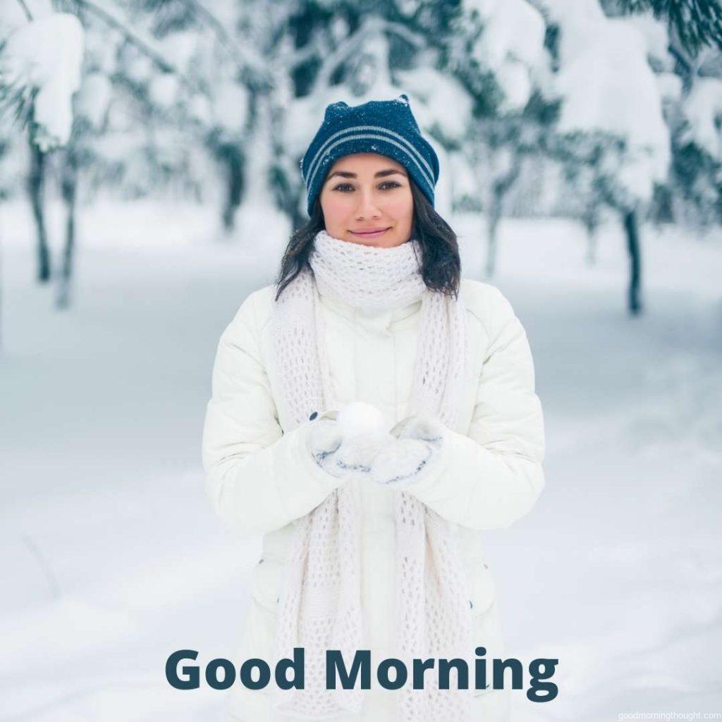 Portrait of a beautiful young girl on a winter day, _Good morning_ text