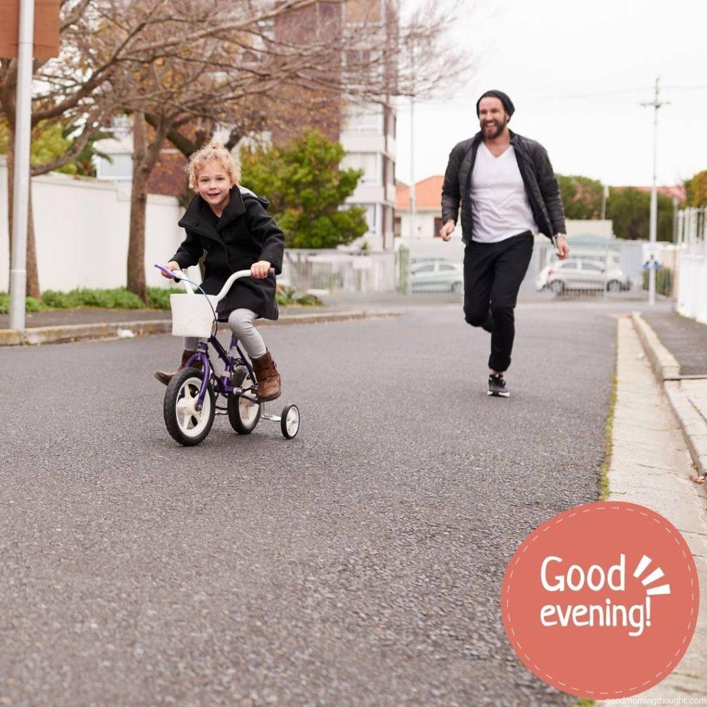 Shot of a father teaching his little daughter how to ride a bicycle in the evening, Good Evening Images