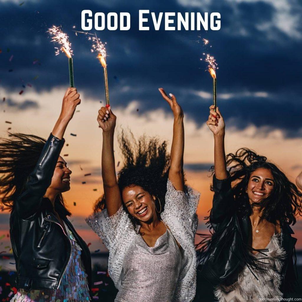 Women Holding Sparklers with _Good Evening_ text