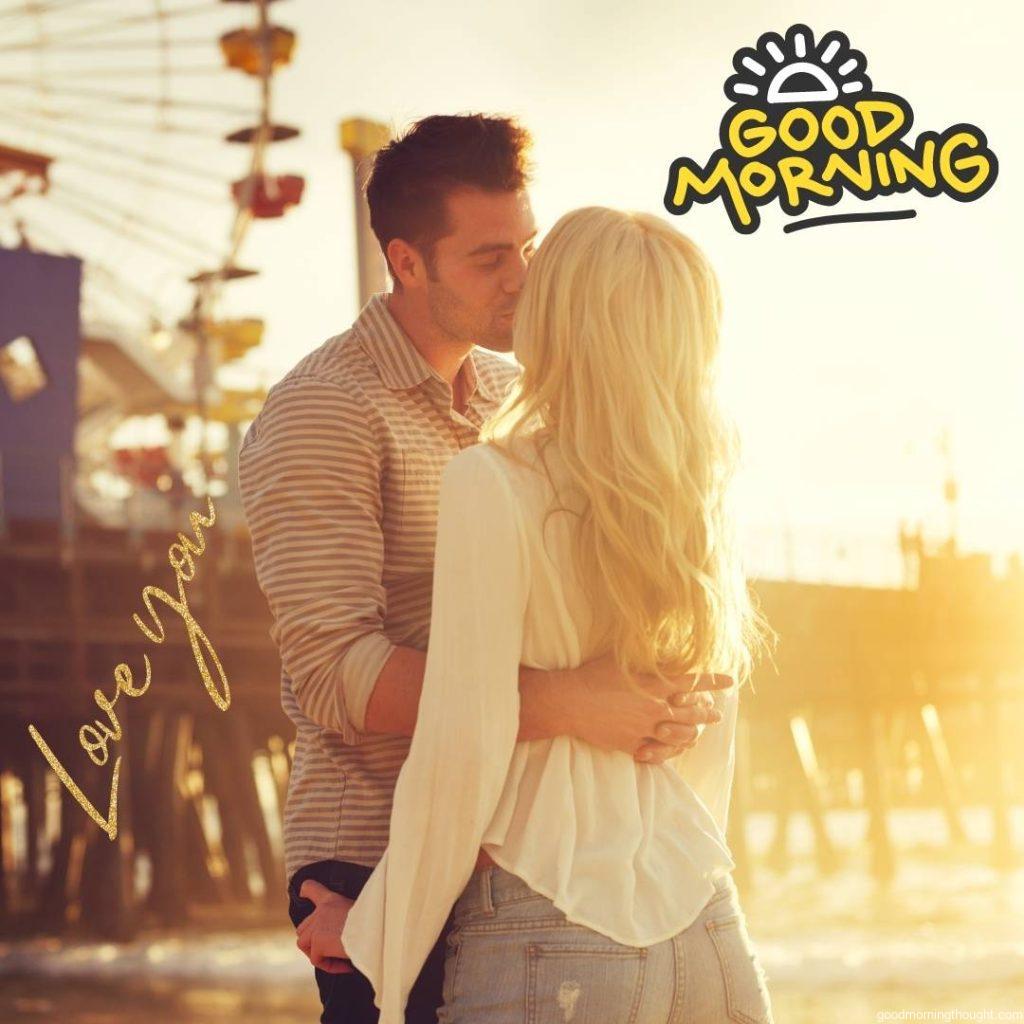 Young romantic couple kissing in front of the sun in Santa Monica, Love Romantic Kiss Good Morning Images