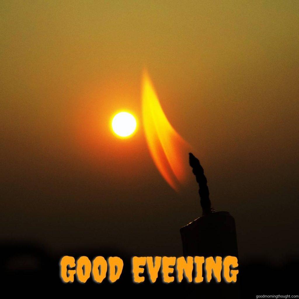 good evening view with candle lightening in front of sunset