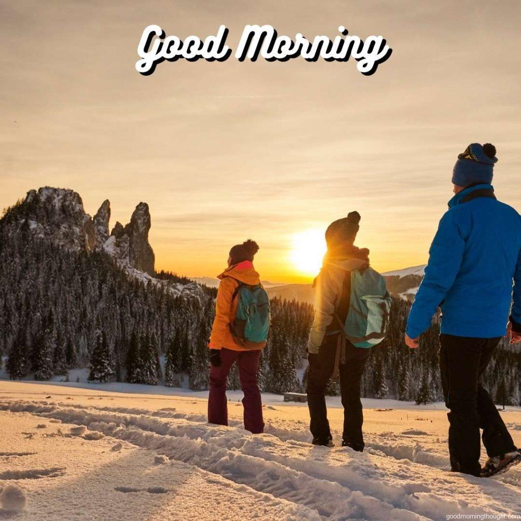 side view of three hiking friends in the winter Good morning, winter images