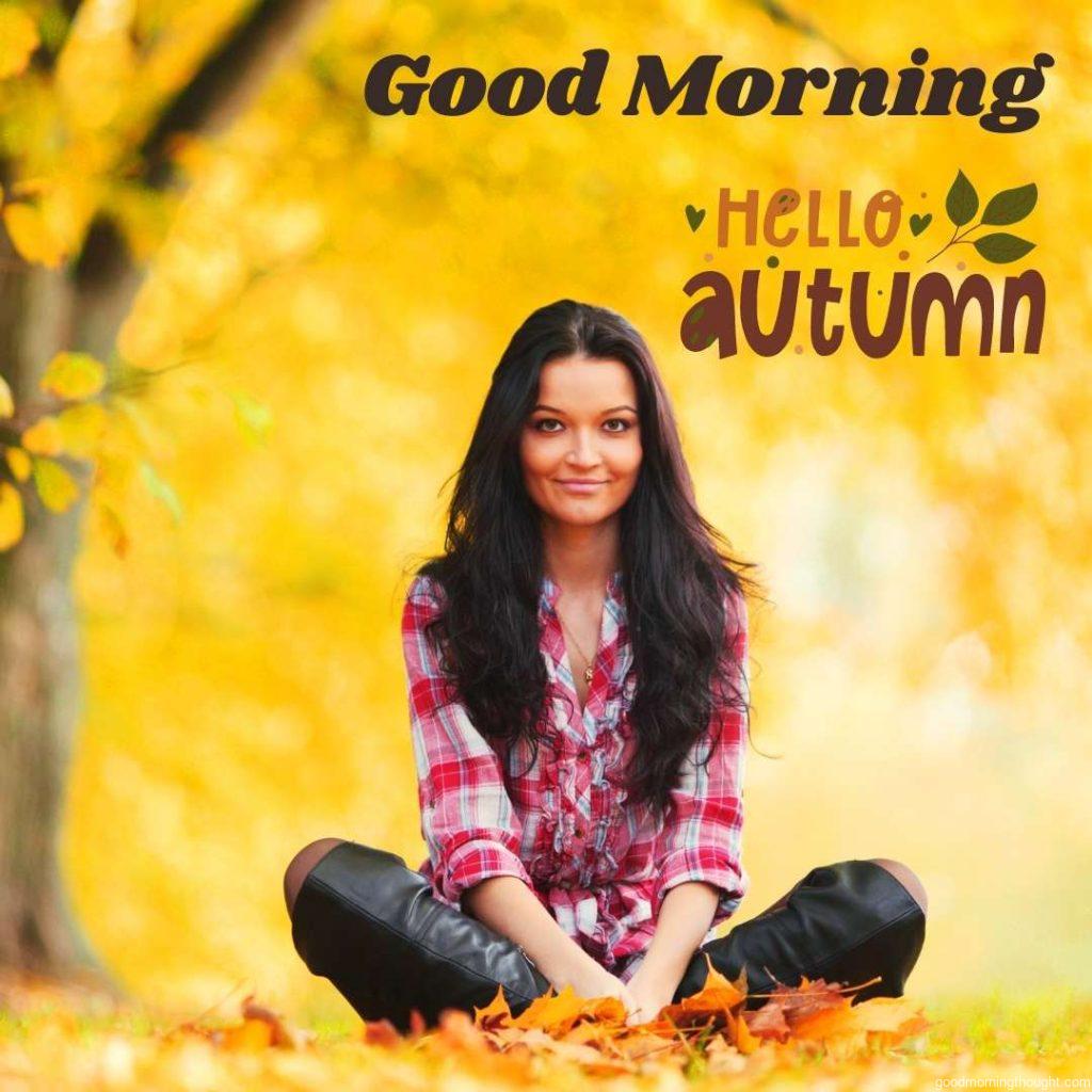 woman on leaves in an autumn park,Beautiful Autumn Good morning image