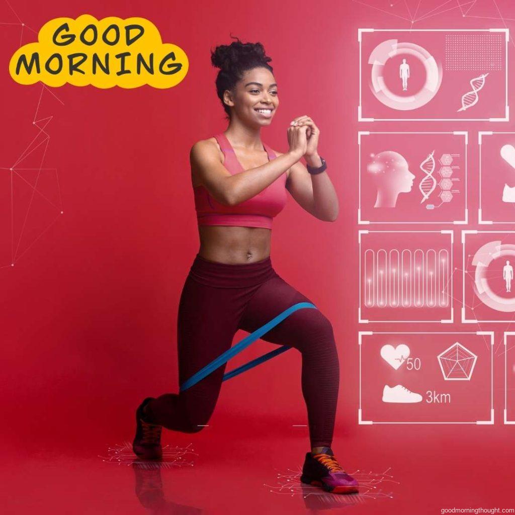 An African American woman squats with a rubber strap. Dual screen with training parameters on a smart watch, African American Good Morning Images