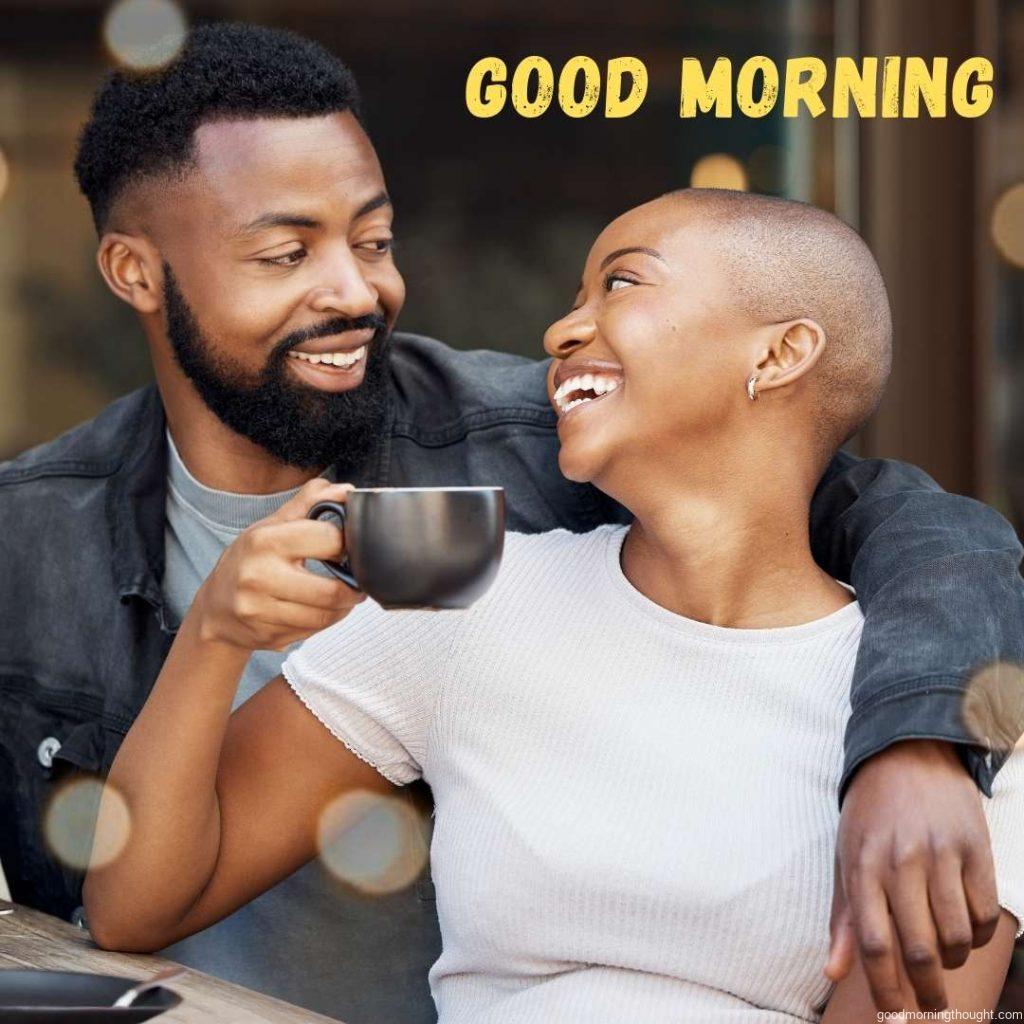 Black couple, coffee and smile for date at cafe, bonding or hug spending quality time together A happy African American man and woman relax in the morning