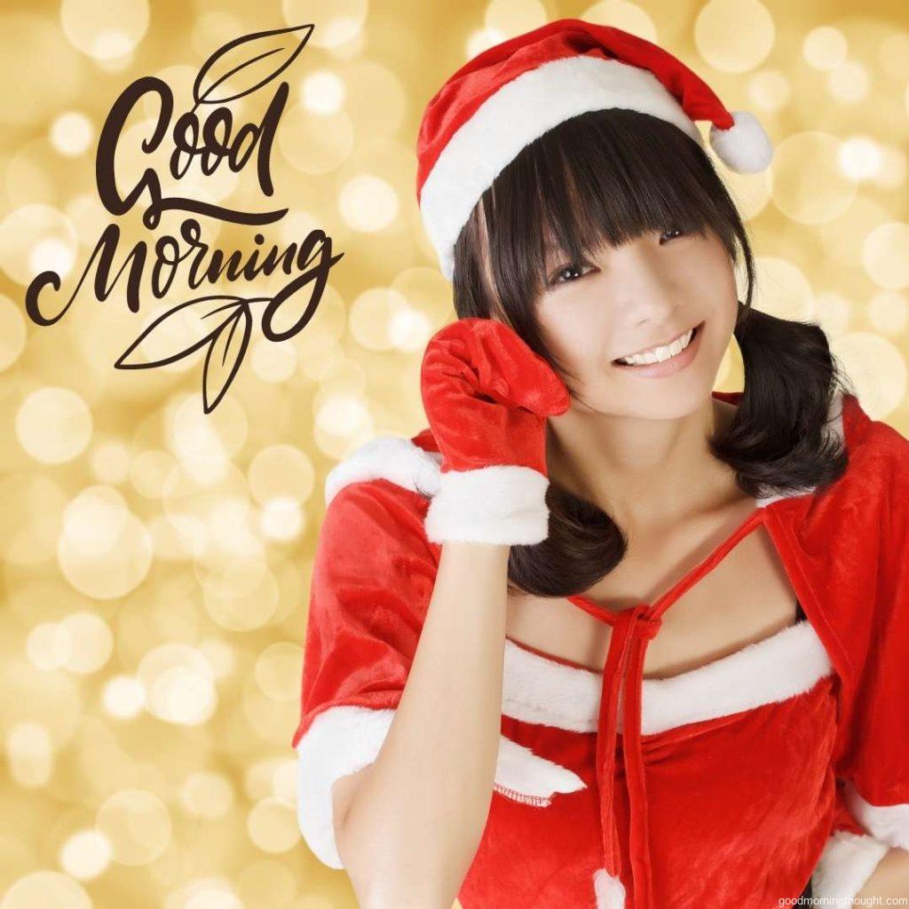 Happy, adorable Christmas girl of Asian descent, closeup portrait. _Good Morning_ text. Happy Good Morning Images