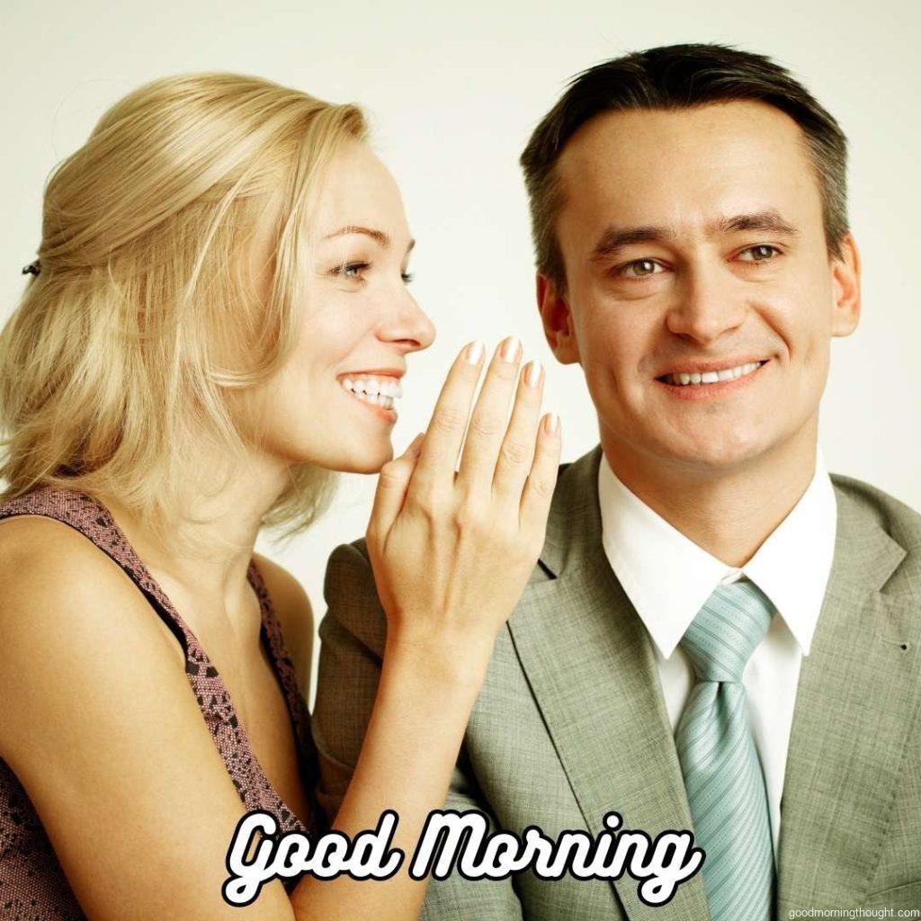 Photo of a happy man and woman talking and laughing, Word Good Morning